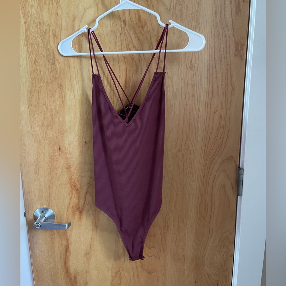 Purple body suit